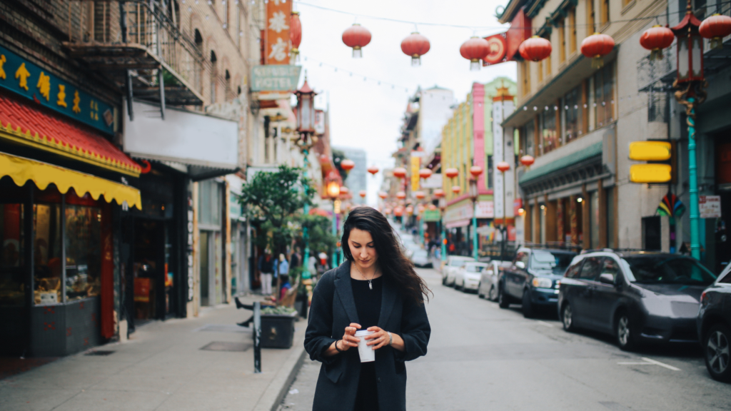 woman traveling alone in chinatown SF