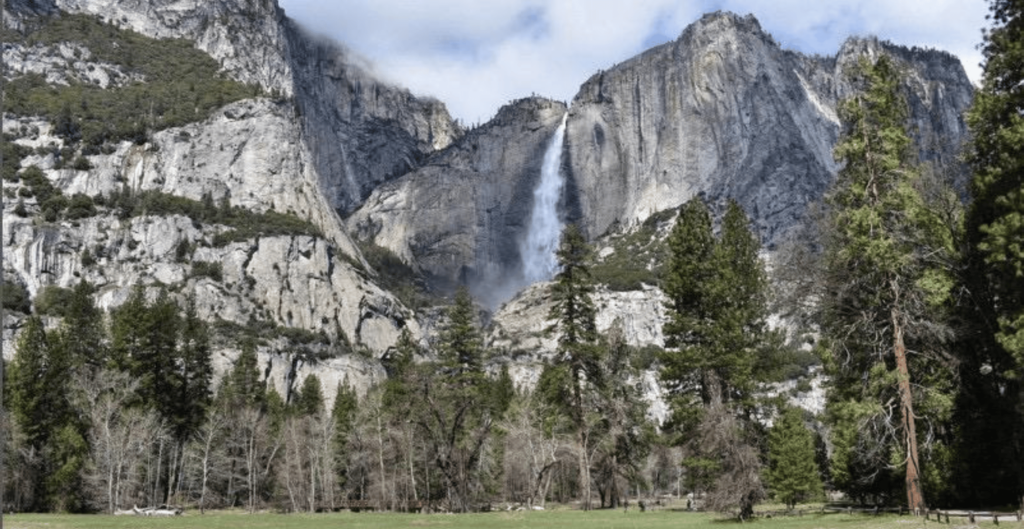 image of yosemite valley with the waterfall running 