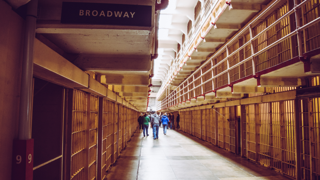 interior view of alcatraz - a hallway lined by jail cells