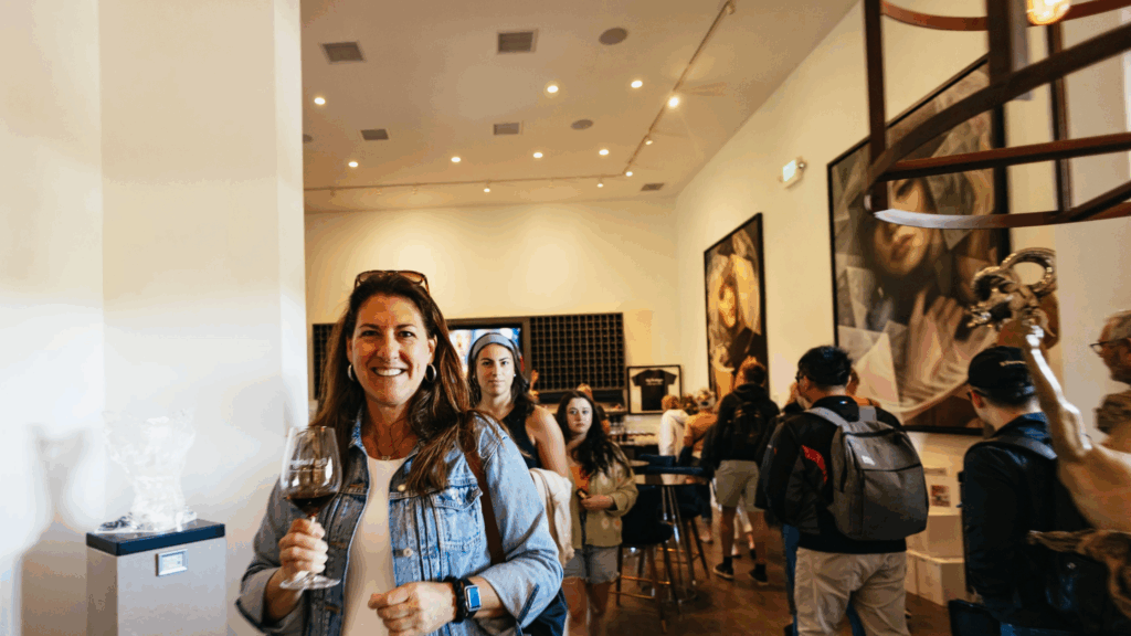 a woman smiling in a winery napa valley